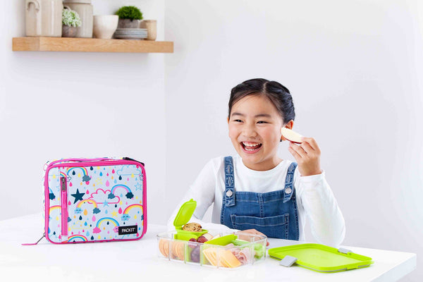 https://packit.com/cdn/shop/products/2020_ClassicLunchBox_RainbowSky_Lifestyle_1_Lores.jpg?v=1696625151&width=600
